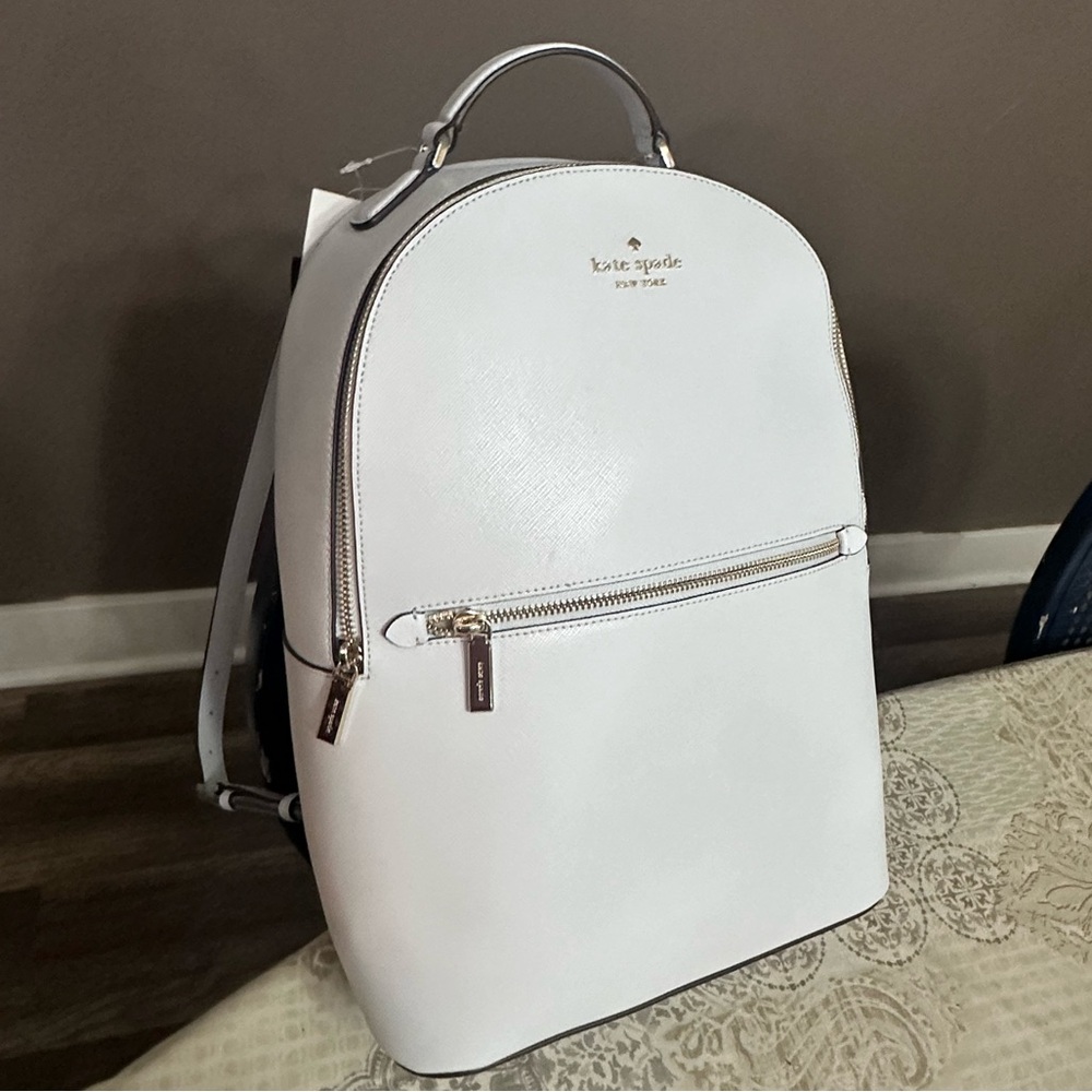 Kate Spade Ivory Backpack with Silver Accents